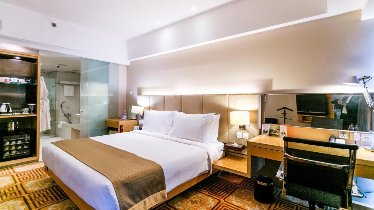 Holiday Inn Binhai Tianjin Quarto foto